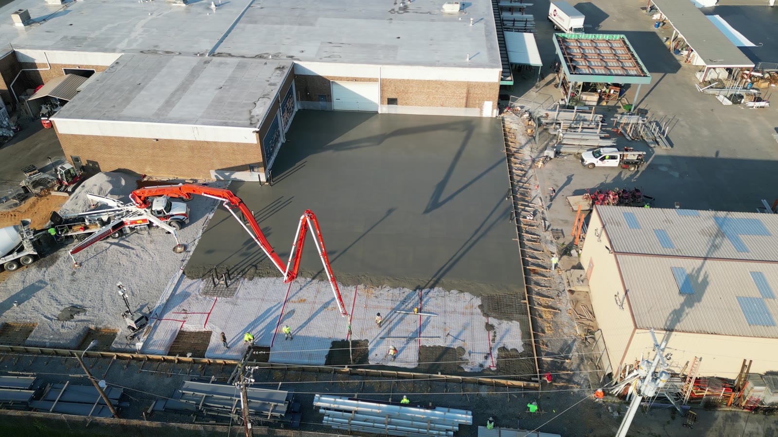 Aerial view of a large commercial concrete slab pour by Esperanza Concrete Design